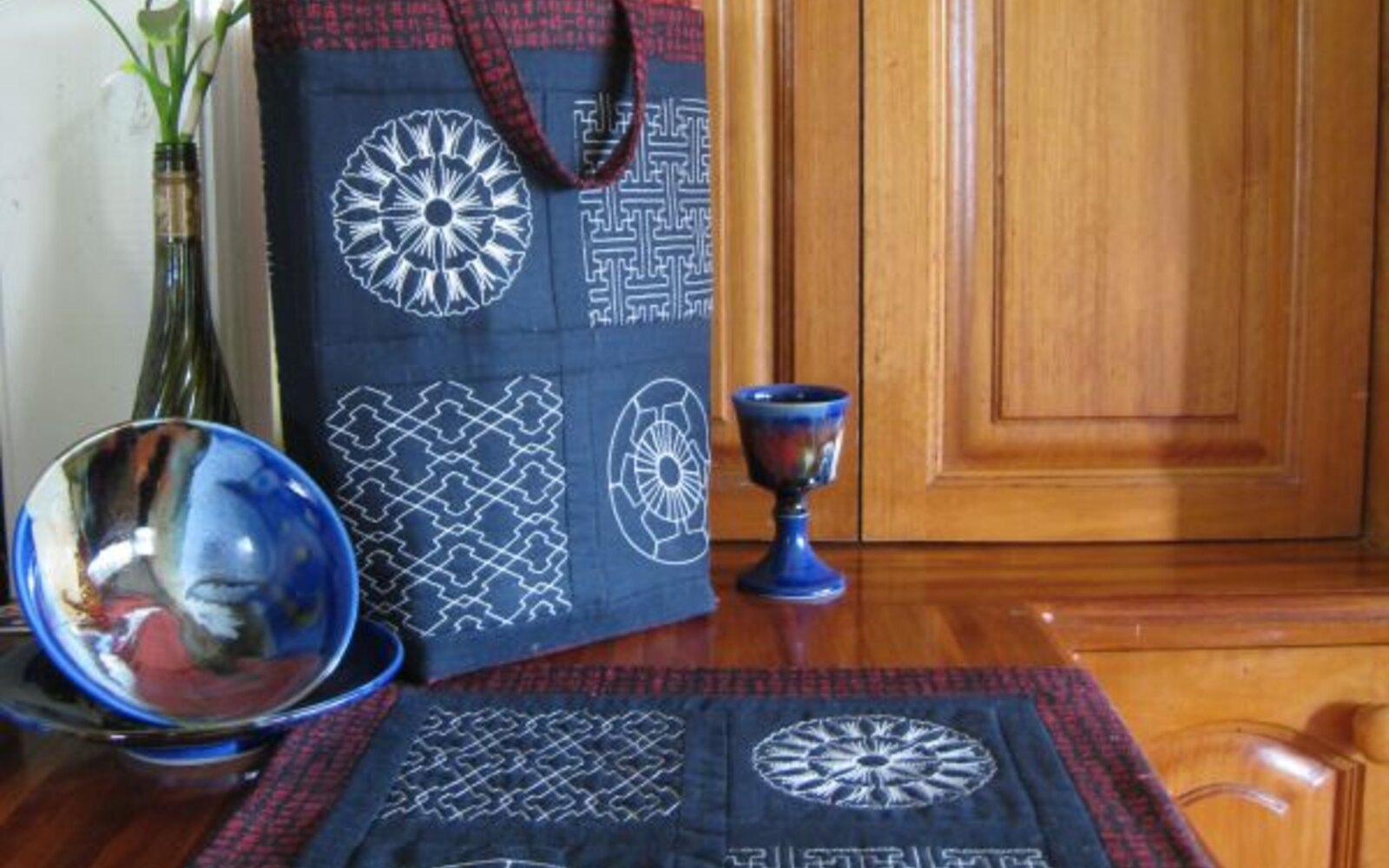 Sashiko tote and table runner styled on a timber bench